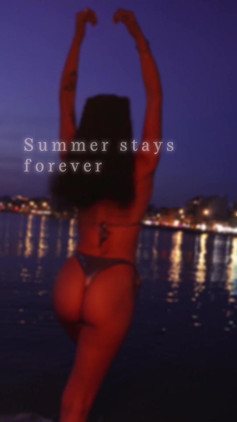 Natti in dark water and warm red light.